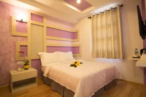 Sunshine Inn Plus - Habitación