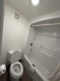 Super 6 Inn & Suites - Bathroom