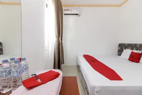 RedDoorz near Sam Ratulangi Airport Manado - Chambre