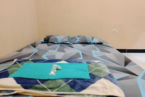 OYO 95109 Eksis Homestay Syariah - Room