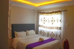 Holiday Premier Hotel - Zimmer