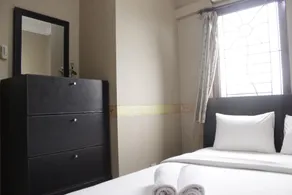 Strategic & Cozy 2BR at Majesty Apartment near Maranatha Christian University By Travelio - Habitación