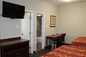 American Inn & Suites - Chambre