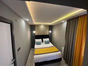 Ulu City Hotel - Værelse