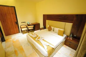 Hotel KNG Grand - Chambre