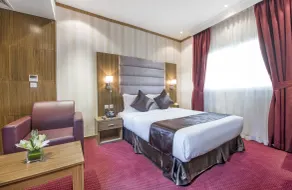 Royal Tulip Hotel LLC - Room