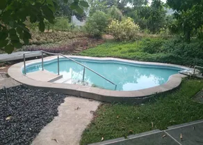 The Homecoming Farmstay Karjat - Piscina