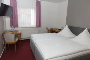 Pension Der kleine Nachbar - Servizio della camera