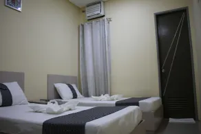 Rusville Hotel & Residences - Chambre