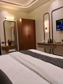 Hotel Sky Inn - Zimmer