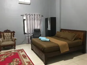 The Carstensz Homestay - Zimmer