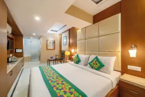 Treebo Premium Vinnie - Near Airport - Chambre