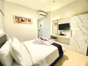 Grand Malioboro Hotel Yogyakarta - Zimmer