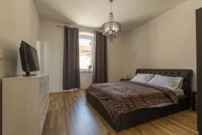 Captain Emo City Apartments - Chambre