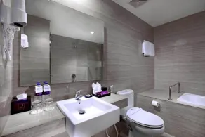 Quest Hotel Balikpapan by ASTON - Salle de bain
