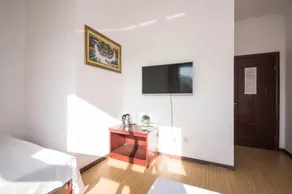 Liuzhuang Huayuhai Holiday Hostel - Habitación