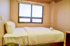 Nice and Cozy 2BR Apartment at Atria Residence Gading Serpong By Travelio - Room