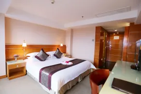 Yihe Hotel Ouzhuang - Pokój