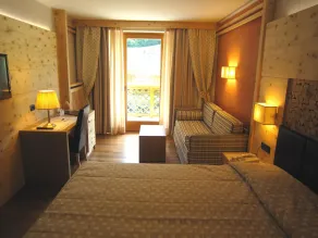 Tevini Dolomites Charming Hotel - Zimmer