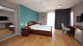 Minerva Hotel - Zimmer