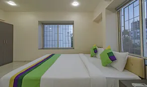 Treebo Atithi Comforts Inn - Room