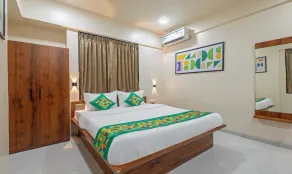 Treebo Sunrise Apartments - Room