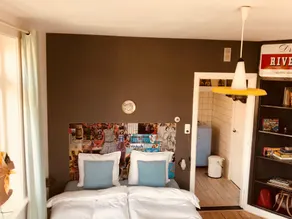 In het huis van Henne van de Enne - Værelse