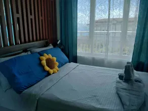 Spacious Studio unit with Balcony and Seaview - Værelse