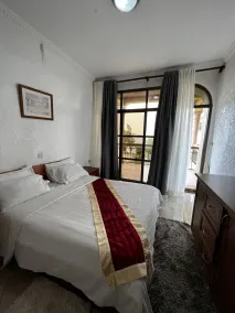Elevate suites Hotel Gisenyi - Quarto
