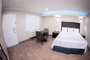 Diamond Bell Inn & Suites - Room