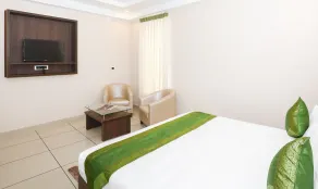 Treebo Durga Boji Grand, Gonikoppal Town - Zimmer
