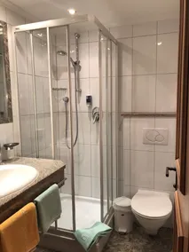 Hotel Garni Central - Zimmer - Studios - Apartments - Værelse