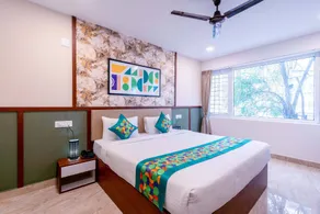 Treebo Emirates Suites Indiranagar - Rom
