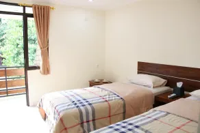 Bamboe Inn Homestay - Chambre