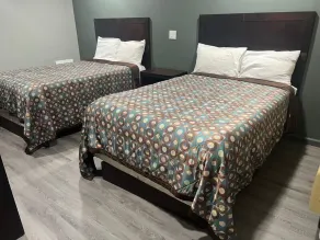 Red Carpet Inn - Chambre