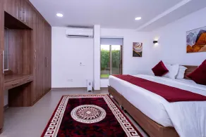 Crest Apartments & Suites - Zimmer