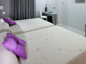 Alix Boutique - Zimmer
