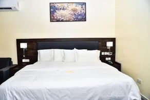 3pple M Continental Hotel & Suites - Zimmer