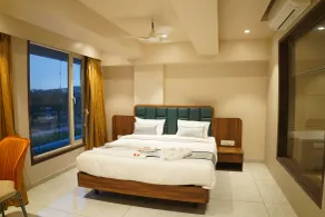 Hotel Status Inn - Quarto