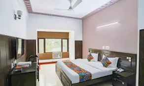 Fabhotel Traika Inn - Room