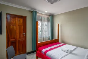 Palm Gardens Guesthouse - Chambre