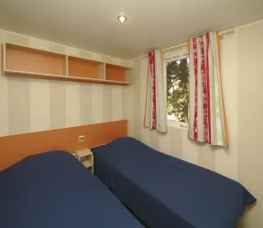 Village Ostriconi Camping, udlejning mobile homes 700 m fra P - Værelse