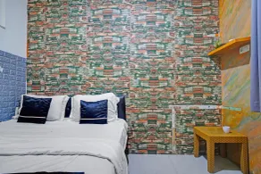 Hotel O near Taman Wisata Alam Punti Kayu formerly Ivy Hotel - Værelse