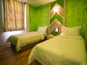 Sunshine Inn Plus - Habitación