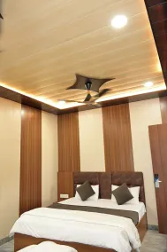 Triveni Hotel And Restaurant - Chambre