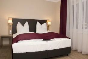 Troll's Brauhaushotel - Chambre
