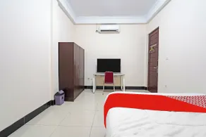 OYO 91322 Jawara Guest House Syariah - Room