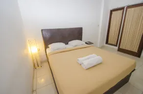 Taman Sari Cottages - Chambre