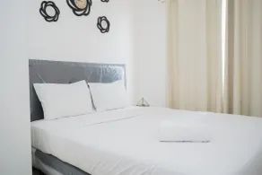 Strategic and Homey 2BR at Puri Garden Apartment near Mall By Travelio - Zimmer