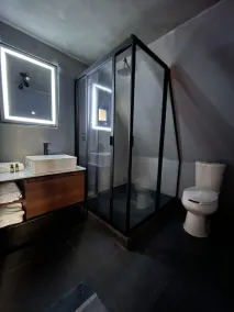 Woodland Cabins - Badezimmer